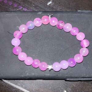 Stretchable purple glass bead bracket with silver star